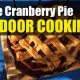 Baking a Apple Cranberry Pie Outdoors in A Cast Iron Dutch Oven