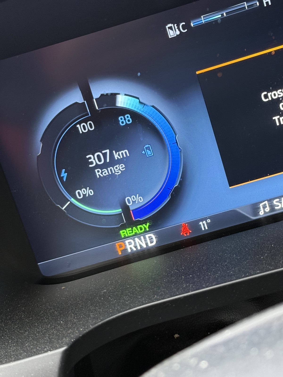 Ford F-150 Lightning display showing 88 percent battery and 307 km range before trailer estimate